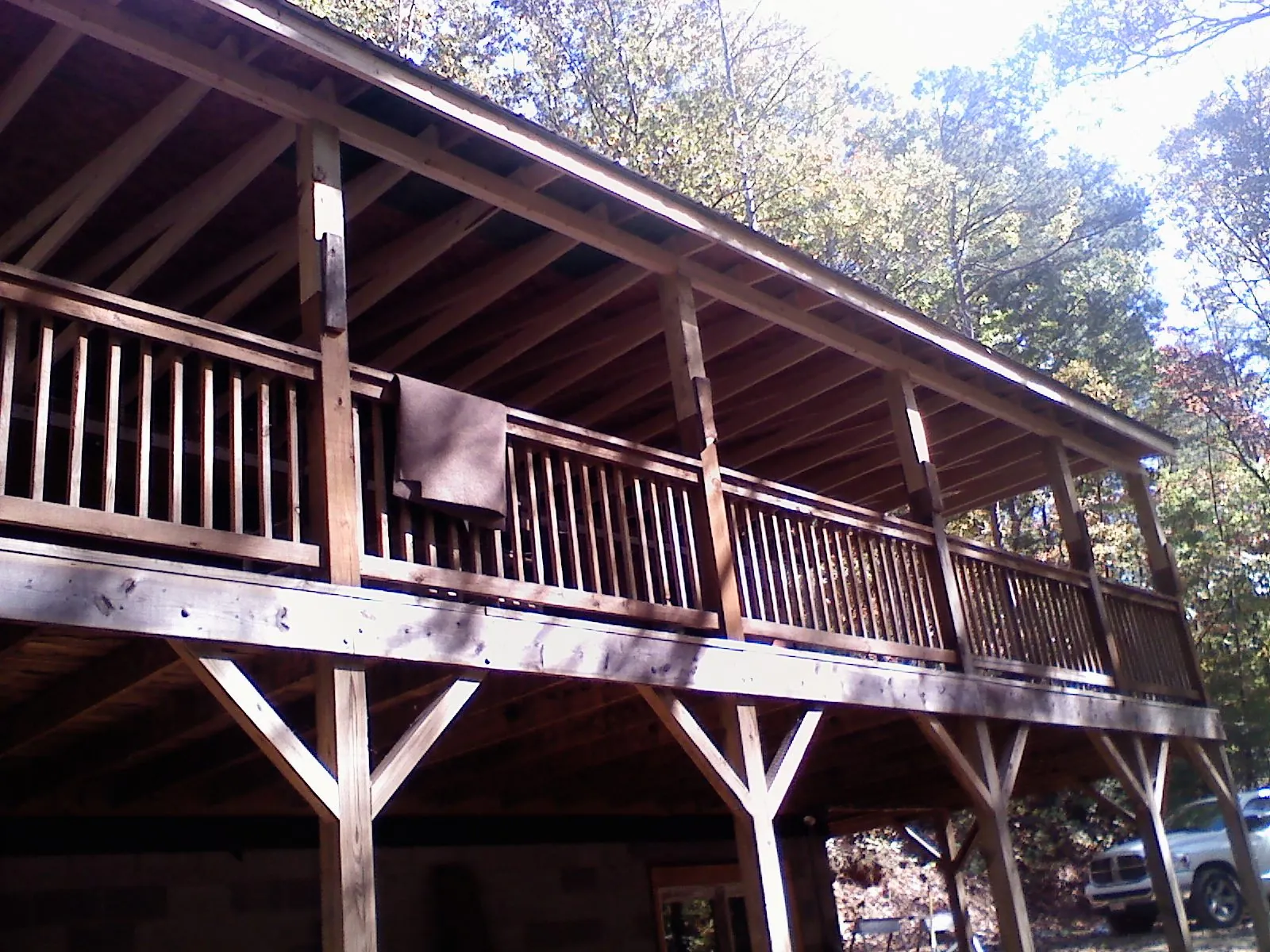 Timber framing under a new elevated porch and deck — Roof Leak Repair in Gulf by Roofing Brothers